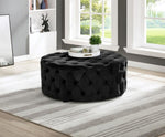 Sherlyn Black Velvet Round Accent Ottoman