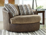 Alesbury Brown Fabric/Chocolate Faux Leather Oversized Swivel Accent Chair