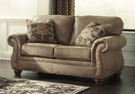 Larkinhurst Earth Faux Leather Loveseat