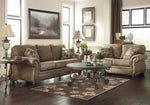 Larkinhurst Earth Faux Leather Loveseat