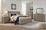 Lettner Gray Cal King Sleigh Storage Bed