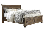 Flynnter Medium Brown Queen Storage Bed