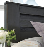 Brinxton Black Wood King Panel Bed