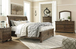 Flynnter Medium Brown Cal King Storage Bed