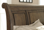 Flynnter Medium Brown King Storage Bed