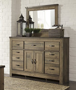 Trinell Brown Wood 7-Drawer Dresser