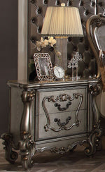 Versailles Antique Platinum Wood Nightstand with Poly Resin Decor